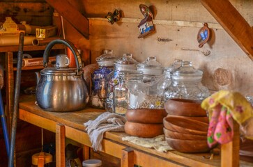 Traditional kitchen shelf with antique kettle