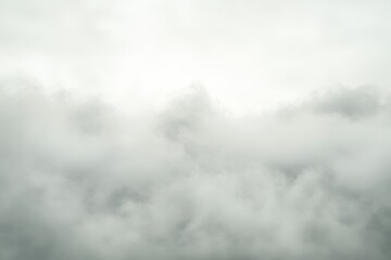 Obraz premium Serene Overcast Sky with Thick Clouds in Soft Gray Tones that Evokes a Sense of Calmness, Mystery, and Tranquility Ideal for Various Creative Projects