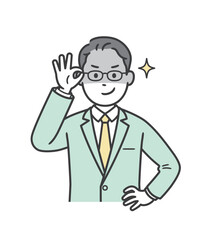 眼鏡を上げて悪巧みしてニヤける若い男性ビジネスマン