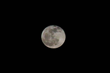 full moon over black