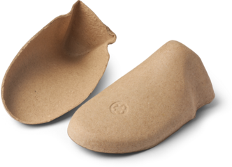 pair of hollow cardboard shoe inserts isolated white background, cost effective tools used to maintain the shape of new shoes during storage, transport and display,