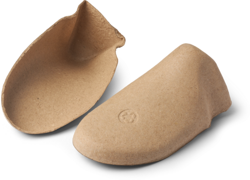 pair of hollow cardboard shoe inserts isolated white background, cost effective tools used to maintain the shape of new shoes during storage, transport and display,