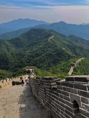 The Great Wall Stretching Across Verdant Mountains