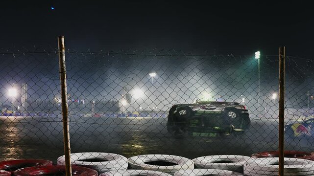 A car performing a dangerous stunt with two wheels in motion, showcasing a thrilling rollover demo and the adrenaline-fueled art of driving