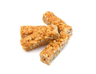 Peanut bars with nuts isolated on white background.