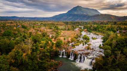 Drone above Bolaven Plateau waterfall near Pakse Laos travel destination motorcycle loop adventure