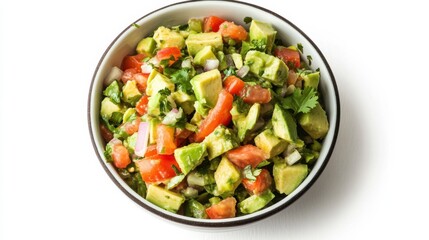 A bowl of creamy avocado salsa with diced avocado, tomatoes, onions