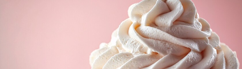A creamy swirl of soft-serve ice cream against a pastel pink background, inviting and delicious.