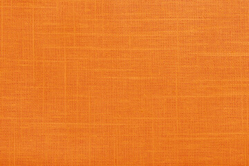 Orange linen fabric cloth texture for background, natural textile pattern.