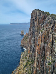 pectacular cliffs of Cape Hauy Tasmania overlooking the ocean, a highlight of the rugged coastal...