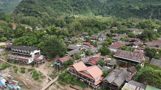Descending drone footage above the small village of Muang Ngoy along the Nam Ou river, Luang Prabang province, Lao PDR