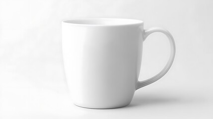 Obraz premium Two Blank White Mugs on Wooden Table with Greenery