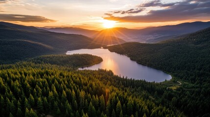 Naklejka premium Stunning sunset over lake mountainous landscape nature peaceful environment aerial view serenity and reflection