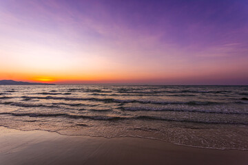 Beautiful sea and sky with calm waves in summer after sunset with twilight light
