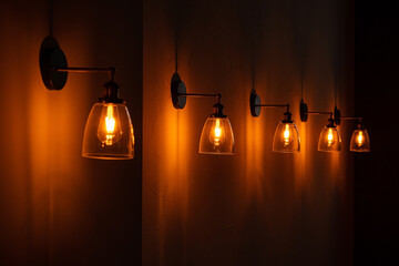 A warm glow emanates from vintage-style light bulb