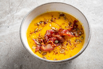 pumpkin soup with bacon and pumpkin seeds