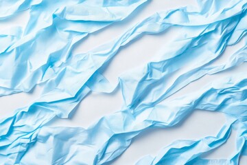 Obraz premium Abstract background of crumpled light blue fabric with texture and folds.