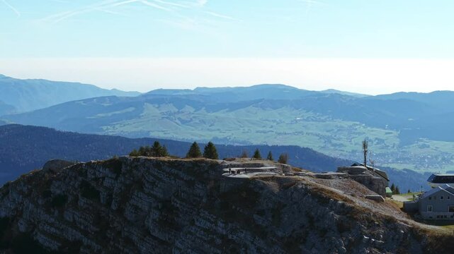 Aerial view of Rifugio Forte Verena, an alpine site atop Monte Verena, surrounded by mountains and valleys. A peaceful and historical mountain landscape in Italy.