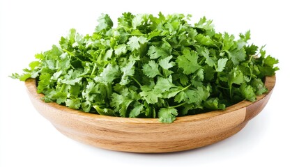Obraz premium Fresh coriander leaves in a wooden bowl on a white background showcasing vibrant green color and natural texture for culinary use