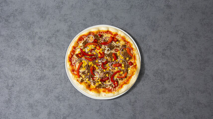 spicy pizza with meat and pepper
