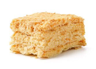 Layers of flaky pastry stacked together on white background showcasing a delicious dessert treat