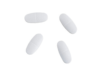 White pills on a transparent background