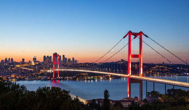Istanbul sunset from most famous and touristic destination Nation Park in Nakkastepe. 15th July Martyrs Bridge (15 Temmuz Sehitler Koprusu). Istanbul Bosphorus Bridge Romantic landscape Istanbul City