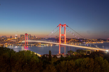 Istanbul Bosphorus Bridge at night. 15th July Martyrs Bridge (15 Temmuz Sehitler Koprusu). Istanbul, Turkey. Famous and best touristic destination Nation Park in Nakkastepe Romantic night landscape