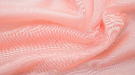 Peach Fabric Texture: Soft, flowing peach-colored fabric with subtle folds and creases creates an elegant and luxurious texture. Perfect for background or design elements. 
