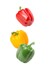 red, green and yellow bell peppers isolated