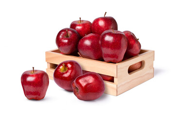 red apples in wooden box isolated