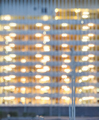 Naklejka premium light at night. blur building with light. blur background park building background.