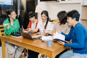 Group of students with books preparing for exams during holidays.