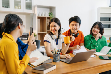 Education knowledge and university concept - group of students reading and preparing for exams on holiday.