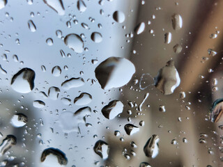 Water drops on the glass, abstract background, shallow depth of field