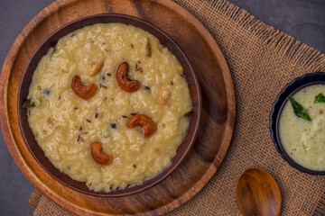 Freshly Made Ven Pongal: A Savory South Indian Dish Ready to Eat with coconut chutney. Fresh made Pongal in a bowl , Tamilnadu daily dish...