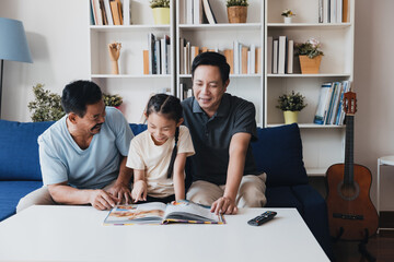 Celebrating family moments with a loving LGBTQ couple and their adopted daughter in a cozy living room