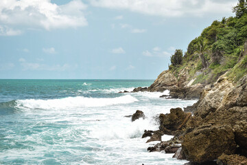 Fototapeta premium Beautiful Mexican beach with blue sea in Oaxaca, Mexico