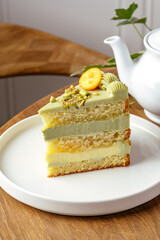 piece of cake with pistachios and cream