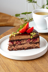 chocolate cake with cream and fresh berries