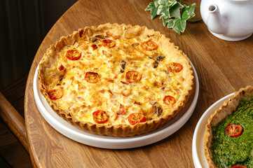 quiche with tomatoes on a plate