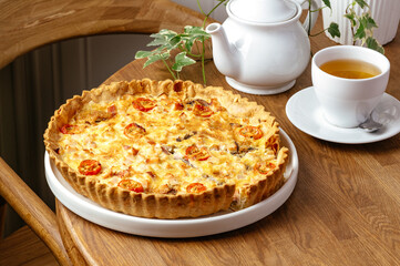 quiche with tomatoes and tea