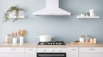 A kitchen scene featuring a stove top with a pot positioned on it, showcasing a culinary setting ready for cooking.