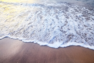 sea foam on the sand abstract background abstract water ocean