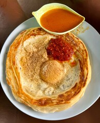 'Roti Canai Sarang Burung' a Malaysian Breafast Signature Dish. Malaysian Food. Malaysian Cuisine.