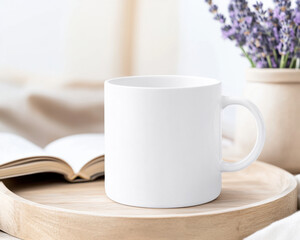blank white mug sits on wooden tray beside open book and vase of lavender flowers, creating serene and inviting atmosphere for relaxation