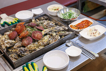 Korean seafood food. Steamed oysters and scallops