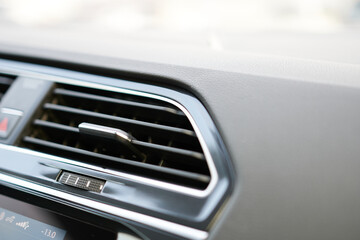 Air conditioner in a modern car, closeup of air conditioner