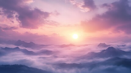 Fototapeta premium A breathtaking sunrise over misty mountains, illuminating the sky in vibrant colors.