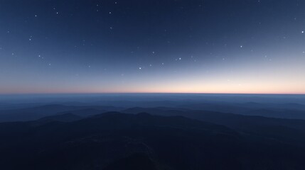 A breathtaking view of a twilight sky over tranquil mountain ranges.